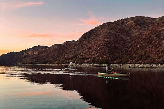 Emerald Cave Sunset Glow Kayak Tour: 3 Caves, Wildlife & Lights - Quiet inlets, snacks, and a chance to swim