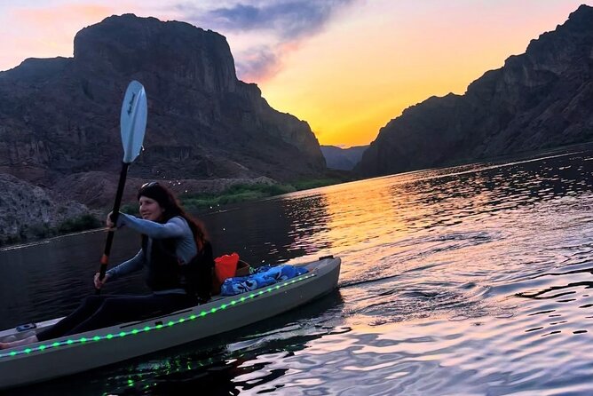 Emerald Cave Sunset Glow Kayak Tour: 3 Caves, Wildlife & Lights - Returning in a glowing kayak at sunset