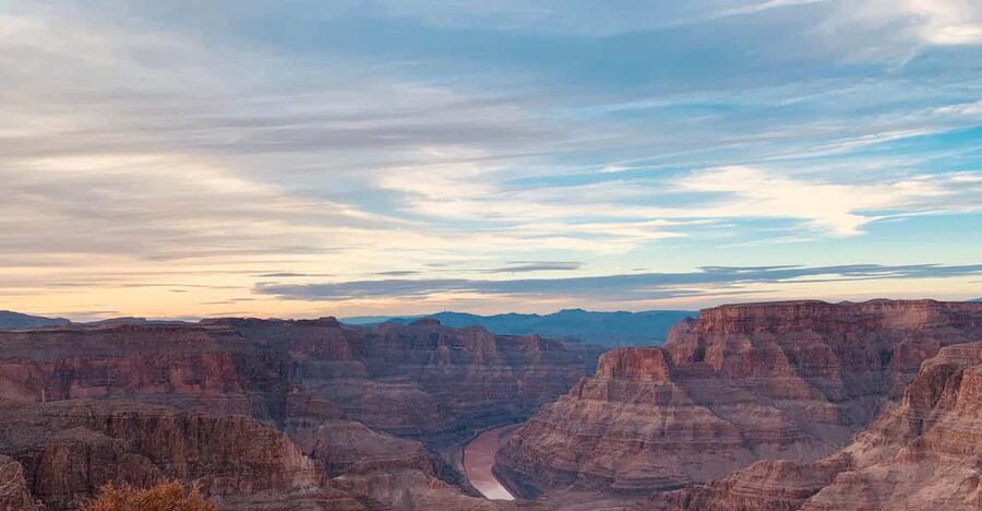 From Las Vegas: Grand Canyon Half-Day Sleep In Tour - Hotel pickup, vans, and the first miles east
