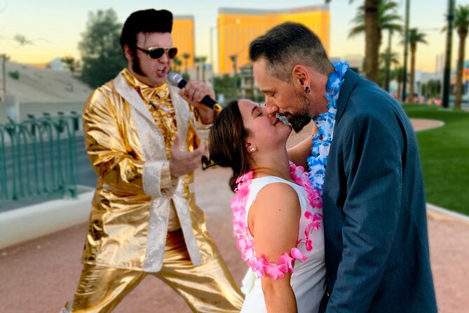 Gold Elvis Wedding or Vow Renewal at Las Vegas Sign - The Las Vegas sign makes the ceremony special