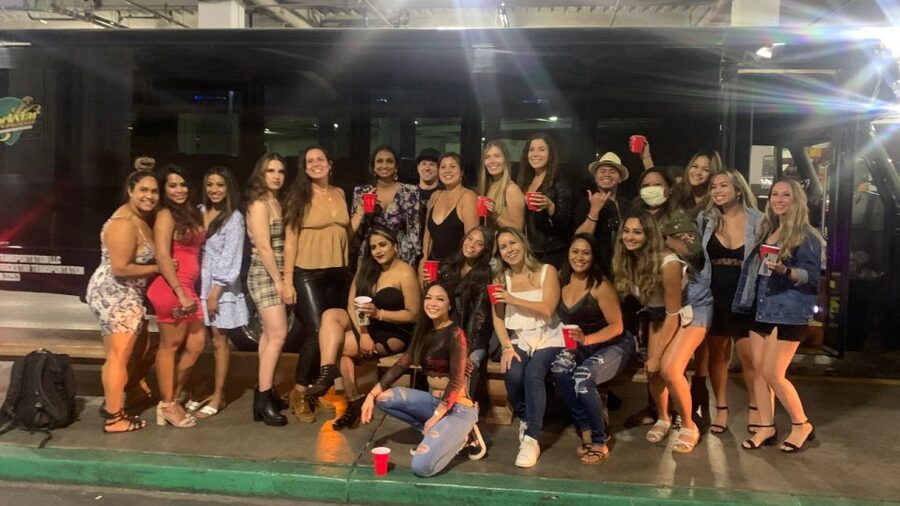 Las Vegas: Private Party Bus Tour Of Vegas Strip w Champagne - Raising a glass before the Strip lights begin