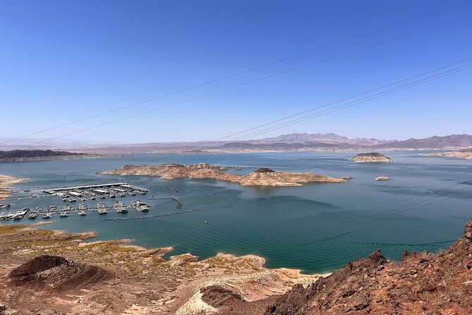 Small Group Max 12 Hoover Dam, 7 Magic Mt. Half Day Express Tour - Boulder City explains the dam before you see it