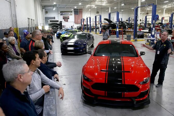 VIP Tour of the Shelby American Experience in Las Vegas - Signing the Carroll Shelby wall
